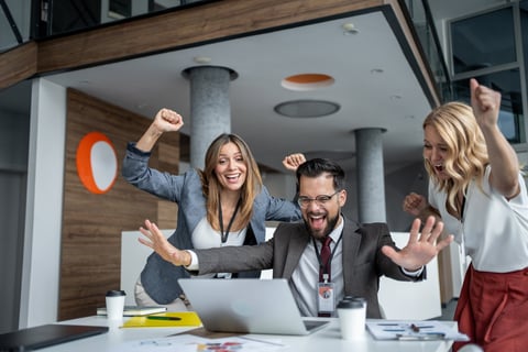 Businesspeople celebrating success